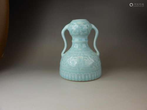 A small Chinese Qing dynasty blue glazed porcelain vase