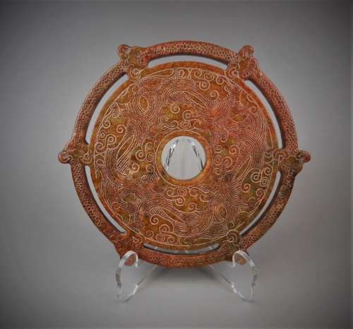 A Chinese archaic jade carved six dragons disc