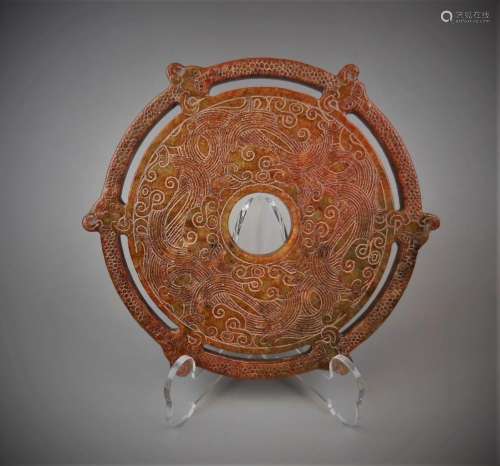 A Chinese archaic jade carved six dragons disc