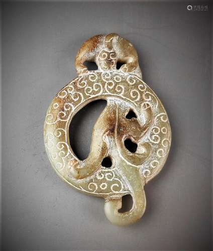 A Chinese archaic jade carved dragon-formed annulus