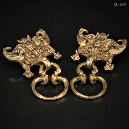 A pair Chinese archaic gilt bronze door knockers