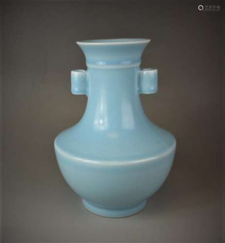 A small Chinese Qing dynasty blue glazed porcelain vase