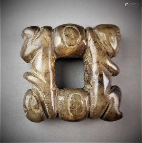 A Chinese archaic jade carved double figure pendant