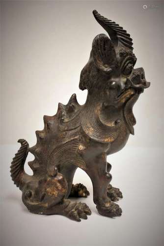 A Chinese archaic gilt bronze qilin