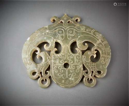 A Chinese archaic jade carved double phoenix pendant