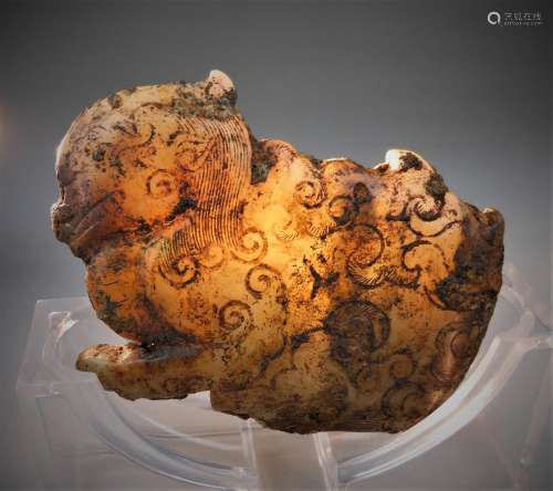 A pair of Chinese archaic jade carved lion-formed pendant