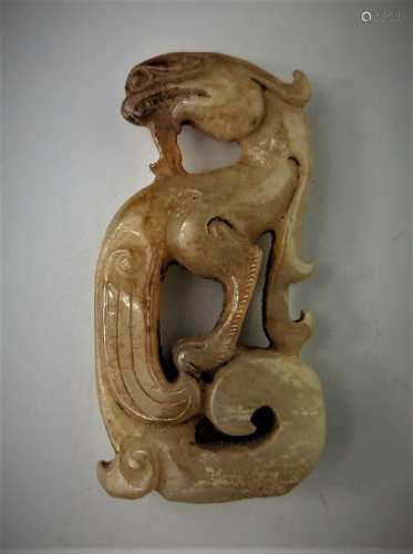 A Chinese archaic jade carved phoenix-formed pendant