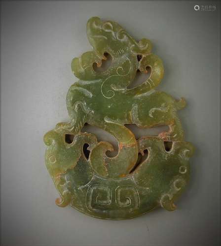 A Chinese archaic jade carved dragon and tiger pendant