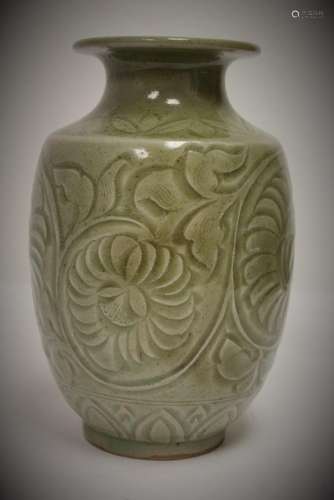 A Chinese archaic Yaozhou-yao celadon vase with carved flowers