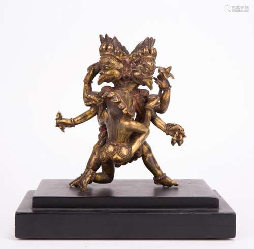 A QING DYNASTY GILT BRONZE TWO HEADED GARUDA