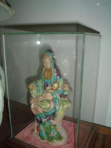 a large ming quanyin porcelain statue.