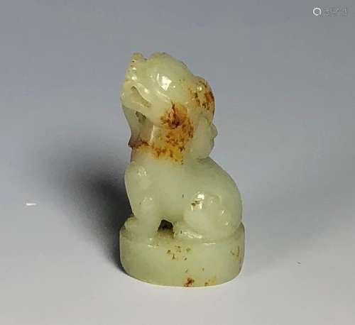 A Coved White Jade Animal Seal