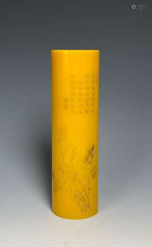 A Yellow Glass Paper Weight