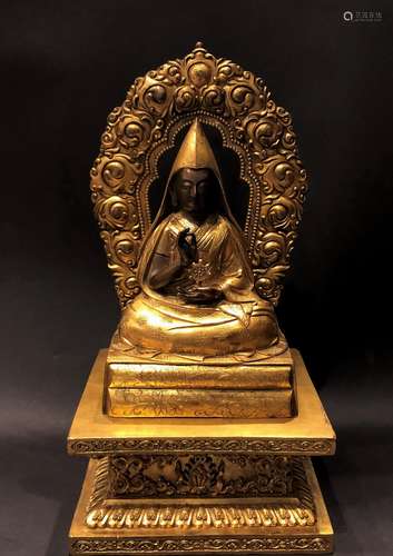 A Gilt Bronze Figure Of Buddha