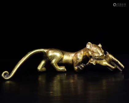 A BRONZE GILT TIGER