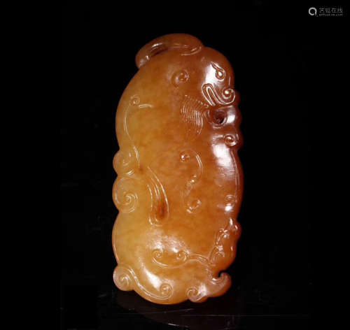 A HETIAN YELLOW JADE CARVED PENDANT