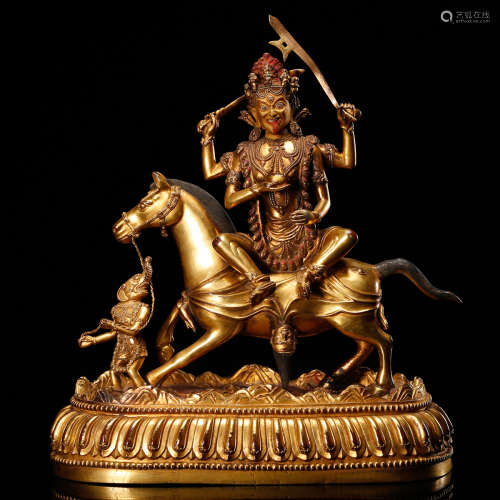 CHINESE GILT BRONZE BUDDHIST FIGURE RIDING HORSE