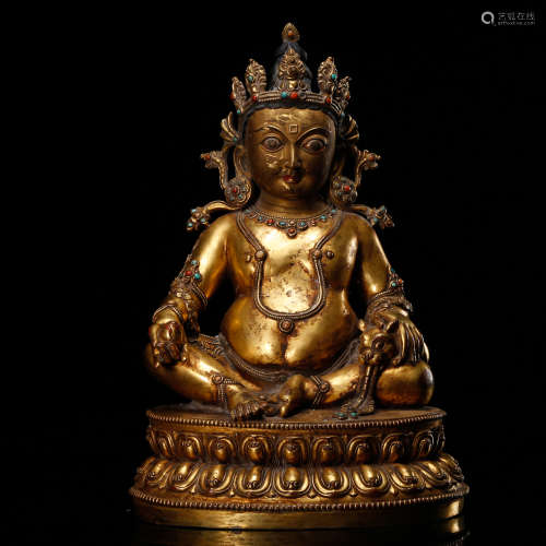 CHINESE GILT BRONZE FIGURE OF JAMBHALA