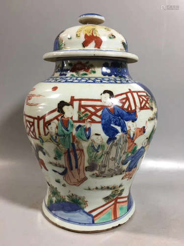 A MULTI-COLORED FIGURE STORY HELMET-SHAPED JAR