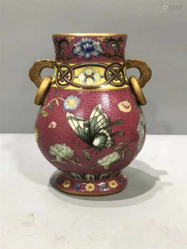 A BUTTERFLY PATTERN RED GLAZED DOUBLE-EAR VASE