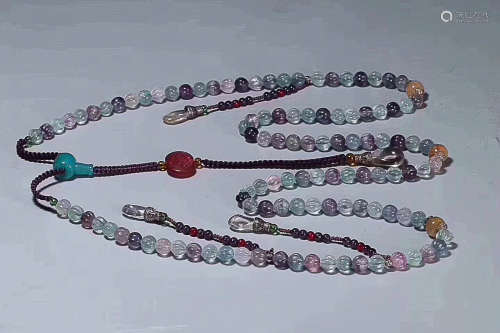 AN OLD  STRING OF TOURMALINE COURT BEADS