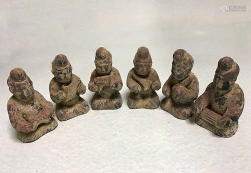 A SET OF TANG DYNASTY MINSTREL FIGURINES