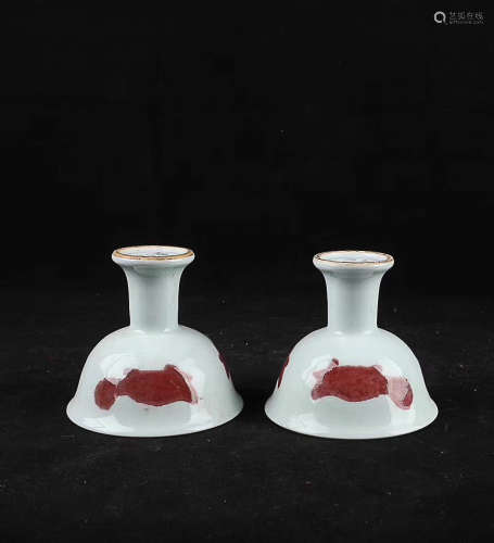 A PAIR OF UNDERGLAZE RED THREE-FISH PATTERN CUPS