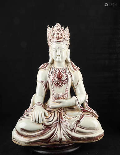 AN UNDERGLAZE RED BUDDHA STATUE