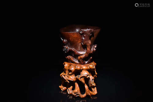 A HAINAN HUANGHUALI WOOD PLUM PATTERN CUP, LATE QING DYNASTY