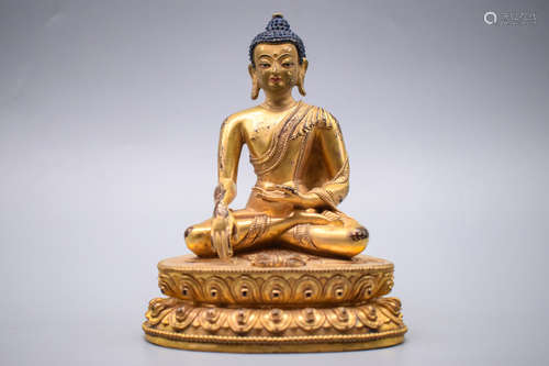 GILT BRONZE 'SHAKYAMUNI' SEATED FIGURE