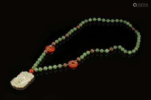 CARVED JADE PENDANT WITH NECKLACE