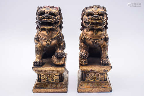 PAIR OF GILT BRONZE CAST 'MYTHICAL LIONS' FIGURES