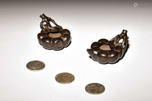 PAIR OF ZITAN WOOD CARVED TEAPOTS AND THREE COINS
