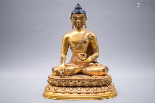 GILT BRONZE 'SHAKYAMUNI' SEATED FIGURE