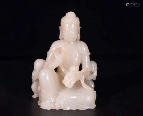 A HETIAN JADE CARVED GUANYIN STATUE