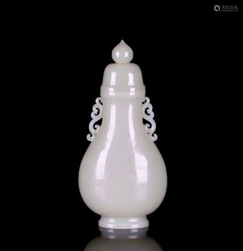 A HETIAN WHITE JADE CARVED VASE