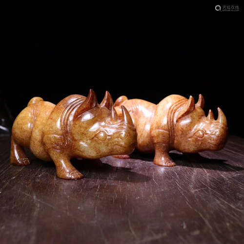 PAIR OF HETIAN JADE RHINOS