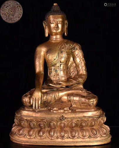 A GILT BRONZE MOLDED SAKYAMUNI BUDDHA STATUE