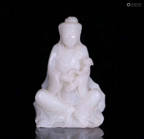 A HETIAN JADE CARVED GUANYIN STATUE