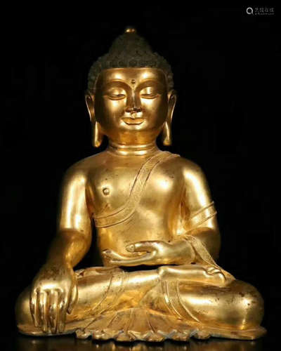 A BRONZE GILTED BUDDHA FIGURE