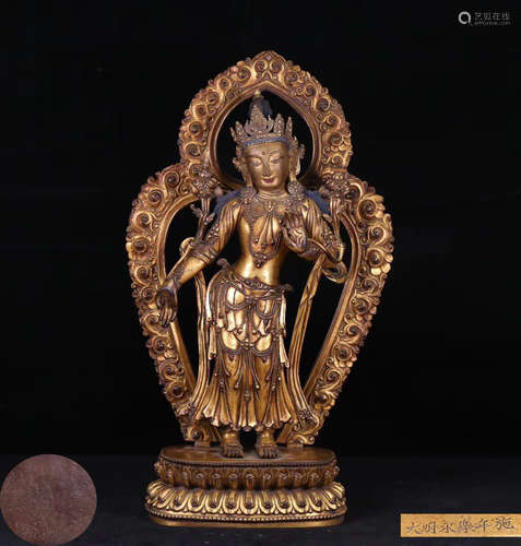 A GILT BRONZE YONGLE MARK BUDDHA STATUE