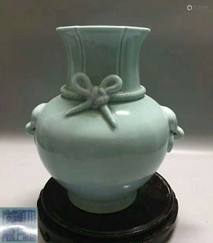 A TIANQING CELADON GLAZED VASE