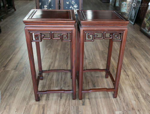 A pair of rosewood table