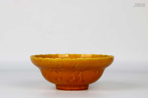 A chinese qing dynasty yellow glaze bowl