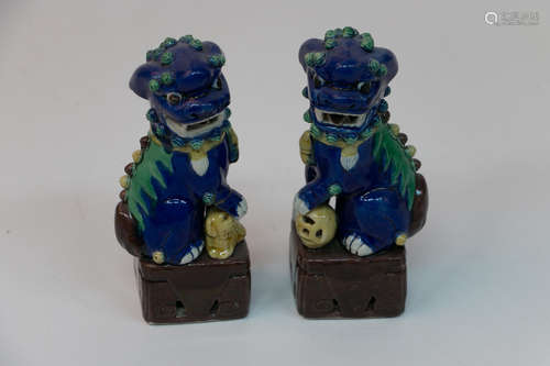 A pair of chinese porcelain statues