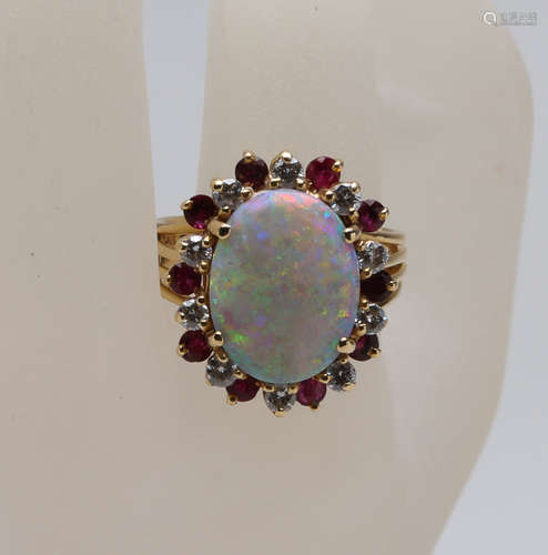 Opal 14k ring beset with diamond and ruby