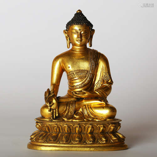 CHINESE GILT BRONZE FIGURE OF SHAKYAMUNI