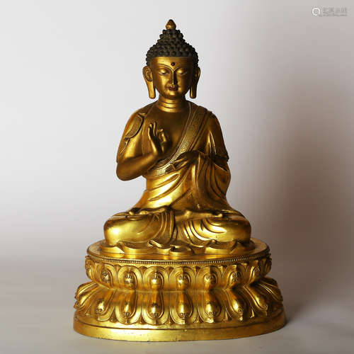 CHINESE GILT BRONZE FIGURE OF SHAKYAMUNI