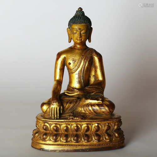 CHINESE GILT BRONZE FIGURE OF SHAKYAMUNI