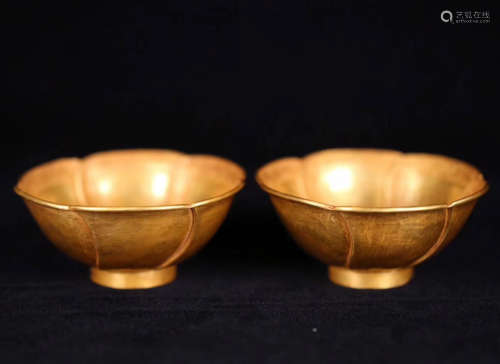 PAIR OF GOLD MOLDED FLORAL SHAPED BOWLS